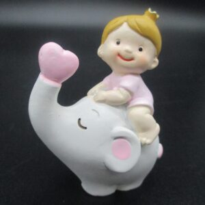 BIMBA SU ELEFANTE ROSA